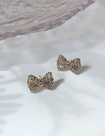 Fashion Apricot Alloy Bow Flashing Diamond Earrings